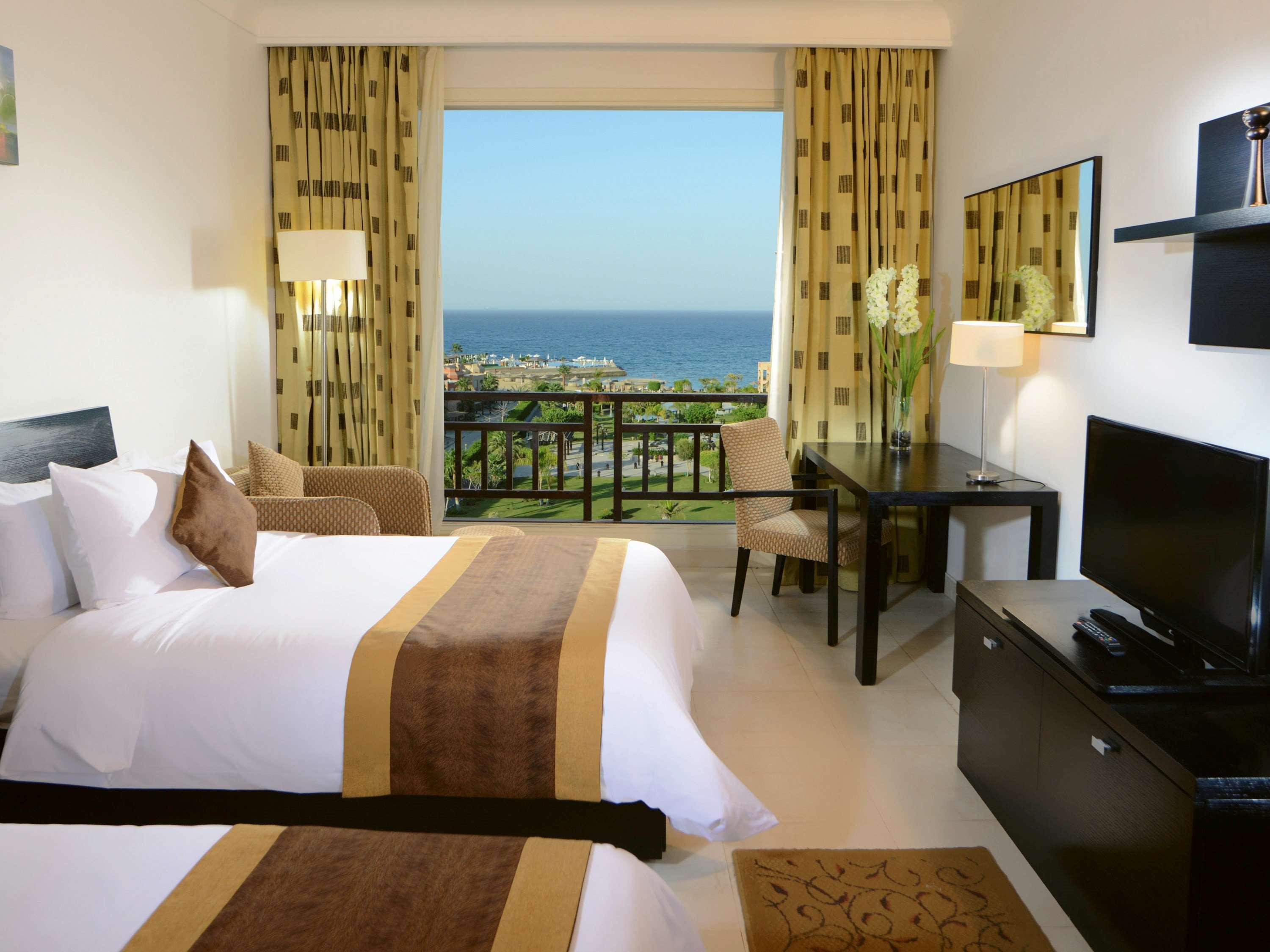 โมเวนพิค รีสอร์ต เอล ซอคนา Hotel ไอน์ ซกนา ภายนอก รูปภาพ A room at the Hilton Sharm El Sheikh